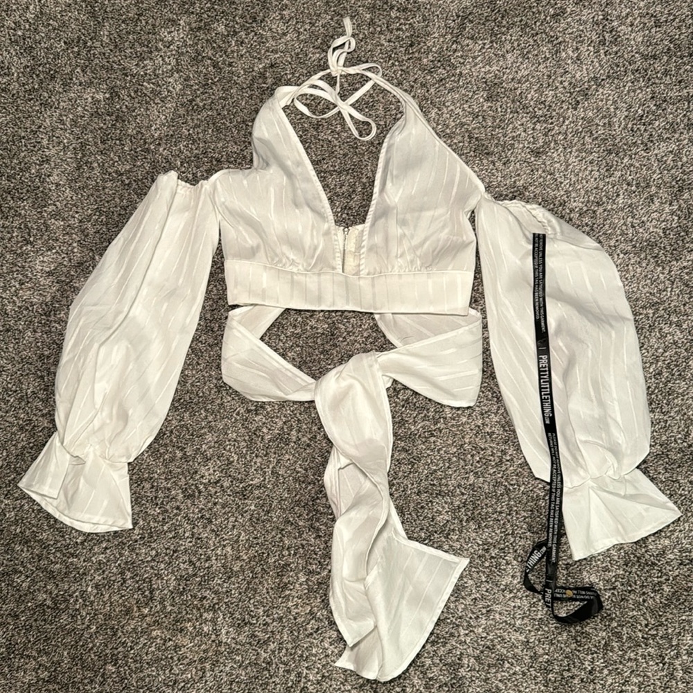 Prettylittlething White Halter Off the Shoulder Tie Crop